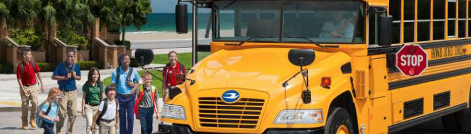  Children getting on a school bus